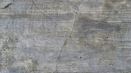 Old grunge concrete surface with weathered cement texture and rough stone patterns, ideal for...