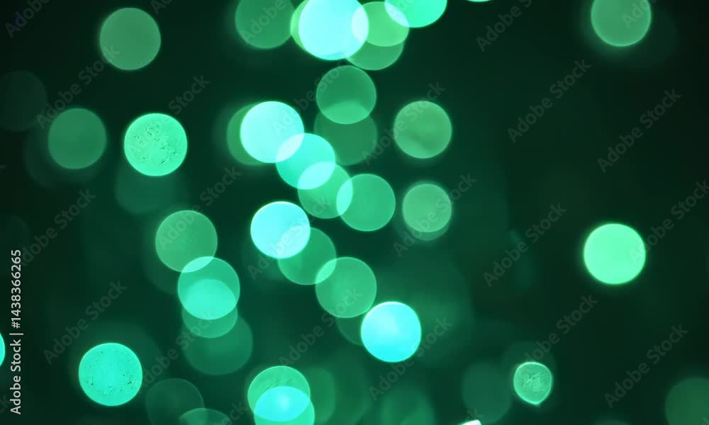 Poster green bokeh lights bubbles moving from bottom to top. abstract background