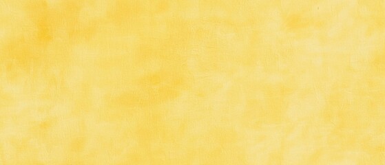 Obraz premium A vibrant yellow textured background.