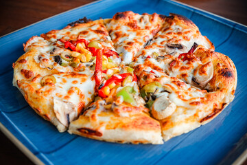 Belgian waffle with fruits on plate, top view, isolated on white background with clipping path