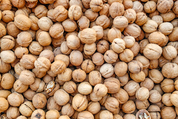 whole walnuts, close-up background
