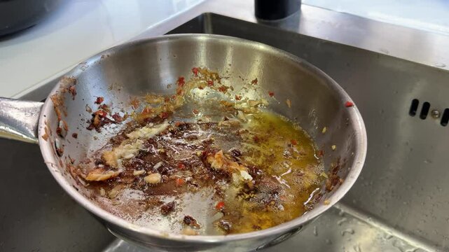 wash dirty grease from a pan dishwashing cooking detergent household chemicals Kitchen