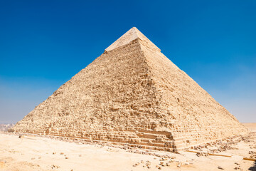 Beautiful majestic Egyptian pyramid of Khafre under the scorching sun of the Sahara desert. Cairo