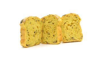 Sliced Pumpkin Bread with Mixed Grains on White Background
