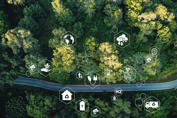 EV car, Electric car or hydrogen energy car on road midst forest and natural. Environmental friendly travel. Sustainable transportation and green logistic to Net zero carbon emission for Save earth.