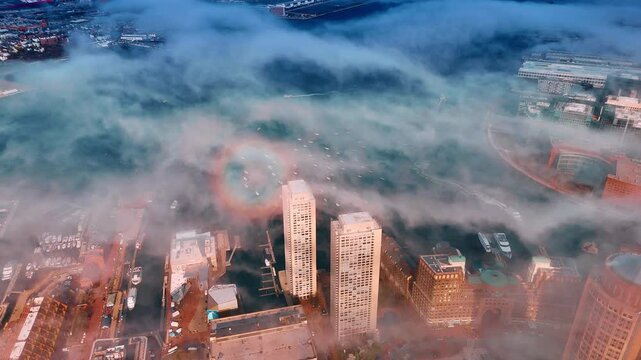 White smoke covers the scenery of the city. Aerial perspective on Boston coated with smoke. Air pollution.