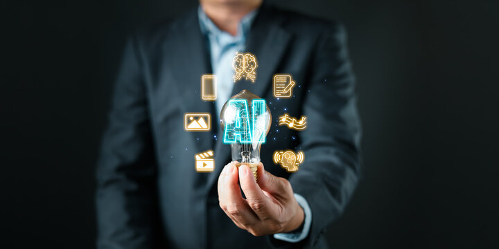 A professional holds a glowing lightbulb with an AI hologram surrounded by icons symbolizing content creation, use, research, and analysis, representing innovation and digital transformation. - Powered by Adobe