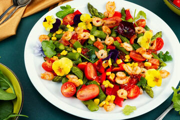 Fresh healthy shrimp salad, modern kitchen.