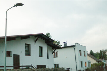 House front of single-family home. Exterior of a residential home at dusk evening.