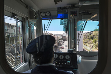 View into the driver's cabin of a monorail in Japan