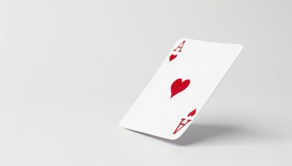 Obraz premium Close-up of a flipped playing card against a pure white backdrop , graphic, playing, red