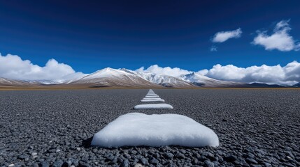 Snowy path to mountains
