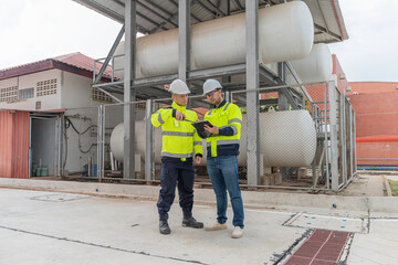 Engineers and supervisor work place to keep liquid helium,preventive maintenance schedule checking,Thailand people,Consult technical problems