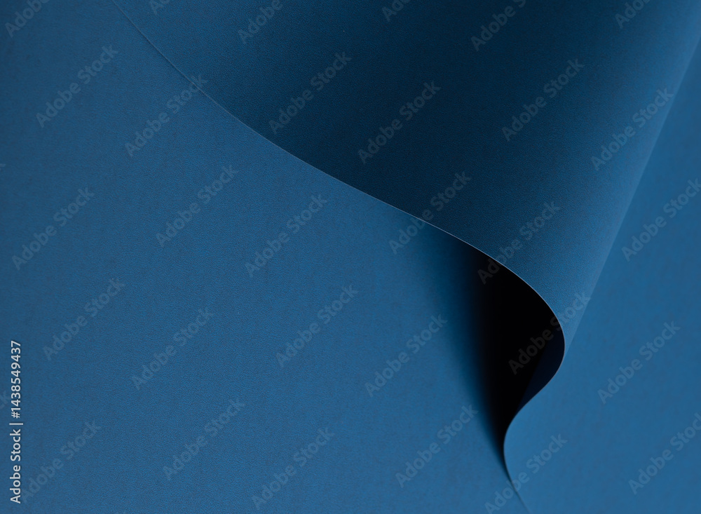 Poster Blue paper texture with deep blue and cobalt tones, smooth matte surface with wavy folds and elegant abstract design, chic and moody finish for a stylish, modern backdrop with rich contrast..