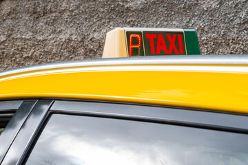 Portugal Taxi sign close-up, yellow cab detail, urban transport, city taxi, transportation service, taxi top light