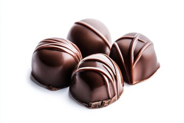 Obraz premium Rich dark chocolate bonbons a decadent treat glistening with smooth dark chocolate intensely delicious and perfect for any
