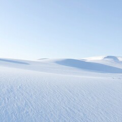 Vast Gently Undulating Snow Covered Landscape Under a Pale Blue Sky.