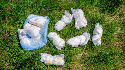 Diaper waste, dirty diapers. Disposal. The impact of disposable diapers on the environment.