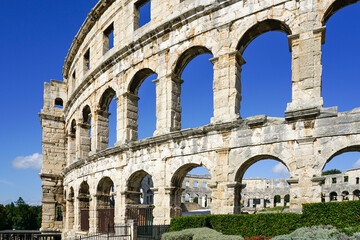 Fototapeta premium Facade of the ancient ruins of one of the largest preserved Roman amphitheaters in Pula, Istria