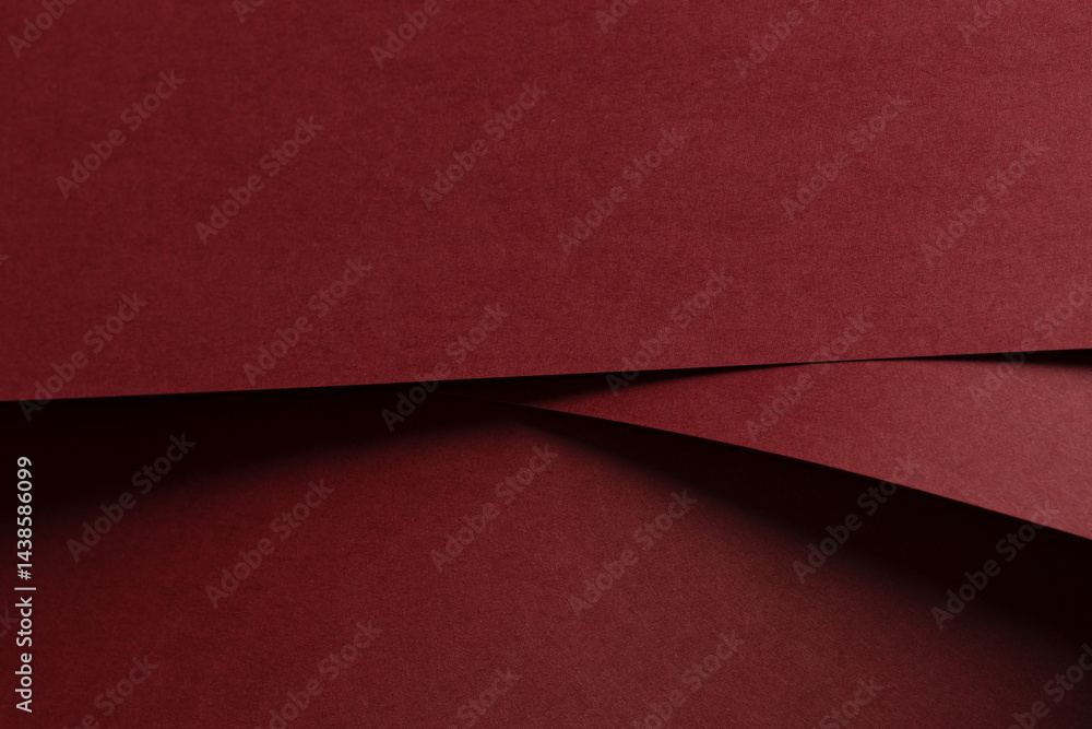 Poster matt paper texture with warm wine red and burgundy tones, sleek, bold lines and curved edges, layere