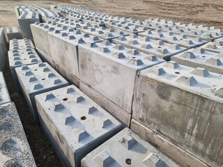 Rows of Textured Concrete Blocks in Storage
Interlocking Blocks for Construction