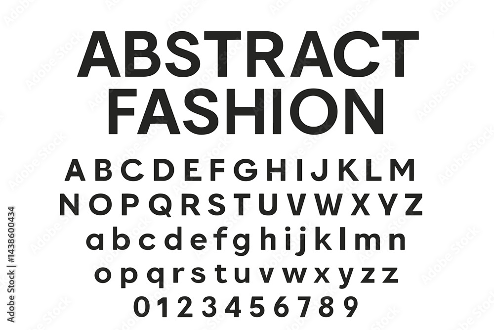 Poster display of bold typography emphasizing abstract fashion in black and white colors on a flat surface