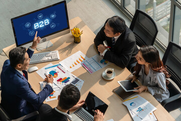 Business person navigates B2B landscape, harness technology to enhance business-to-business...