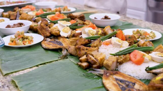 Enjoying a boodle fight feast in the Philippines with friends and family