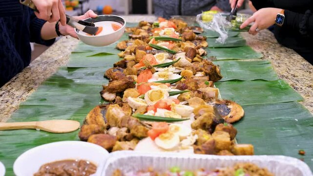 Experience boodle fight tradition in the Philippines with flavorful dishes and fun