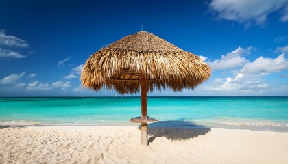 thatched parasol sunshade on a beautiful tropical caribbean beach in cuba