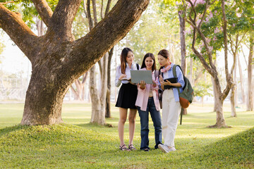 Fototapeta premium A group of university students engages in independent learning activities beyond the classroom, collaboratively sharing knowledge and experiences among peers.