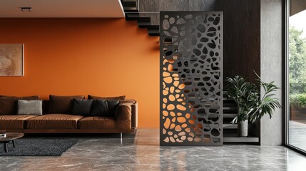 Modern living room with metal room divider, orange wall, and staircase