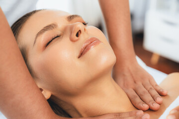 Caucasian woman customer enjoying relaxing anti-stress spa massage and pampering with beauty skin...