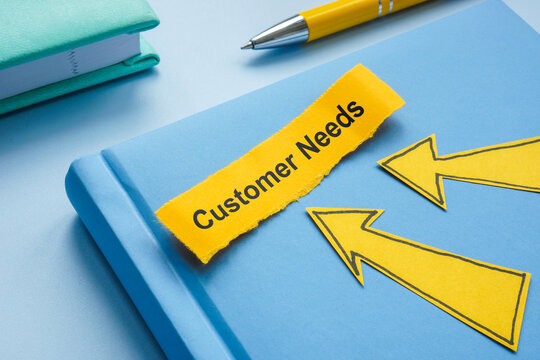 Customer needs written in notebook. Client satisfaction.