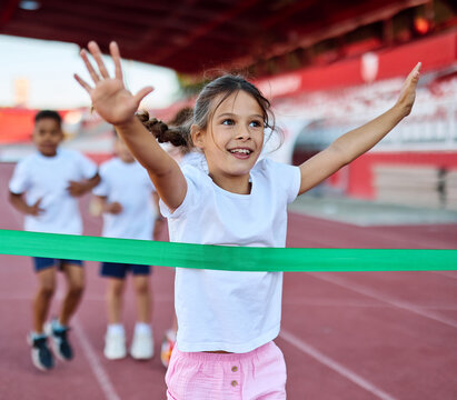 child sport athlete competition running race victory success win winner exercise sprinting runner achievement finish line finish celebration challenge happiness winning motivation excitement