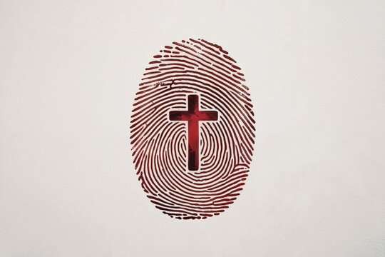 Christian Identity Red Cross Symbol in Fingerprint on White Surface