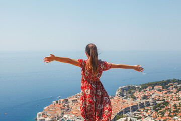 Experience the Freedom and Joy Embracing the Stunning View Over Dubrovniks Landscape