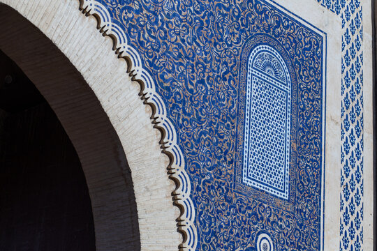Architectural detail on a beautiful square and Arabic style patterns and arch heritage architecture building in a famous landmark in Medina District in Fez, Morocco