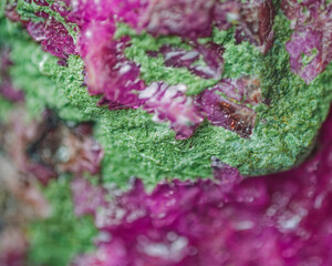 Cobaltocalcite with Kolwezite (green structural type of malachite) on matrix. Kolwezi, Lualaba, DR Congo. High magnification microscopy, scale of 10X