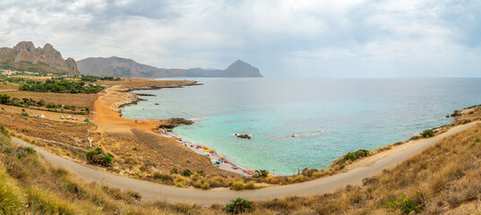 Panoramic view of Caletta del Bue Marino, San Vito Lo Capo,  Spiaggia di Isulidda, Trapani, Sicily, Italy. Dramatic clouds.