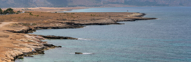 Panoramic view of Caletta del Bue Marino, San Vito Lo Capo,  Spiaggia di Isulidda, Trapani, Sicily, Italy. Dramatic clouds.