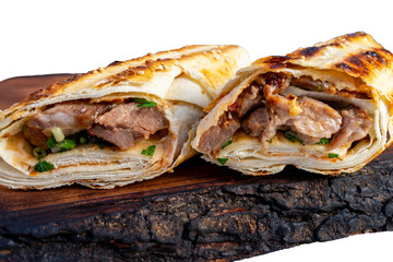 Delicious wrap filled with tender meat and fresh vegetables