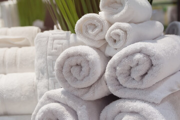White towels on a shelf in a store