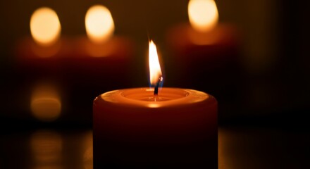 Glowing wick surrounded by calm, dreamy atmosphere.