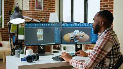 Engineer designs a turbine in an industrial office using CAD software. Working from home with dual monitors and tools for 3D rendering, boosting productivity and technical precision. Camera A.