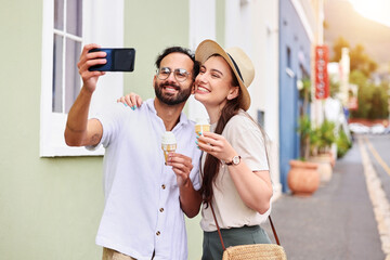 Outdoor, couple and selfie with ice cream on vacation, adventure and tourists with photography in Italy. People, man and woman with love, document experience and dessert on honeymoon trip by road