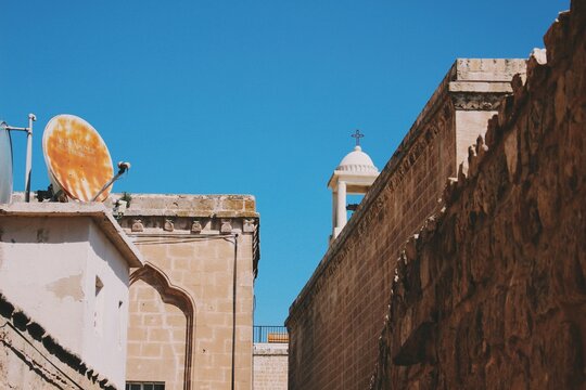 A historical church bell in Mardin ancient city streets