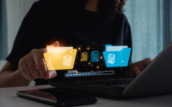 Woman hand touch on folder for sending of document on internet. Data transfer, transfer file of data between folder, Backup data, Exchange of files, DMS. Virtual document loading to another folder.