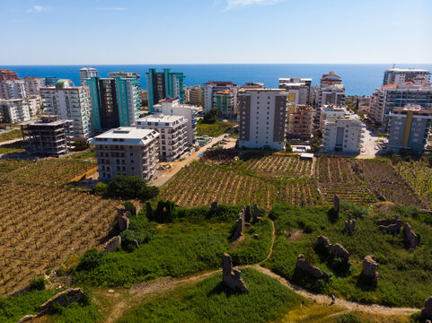 Drone photo of Naula Ancient City ruins within Naula quarter in Mahmutlar. Antalya Province, Turkey.