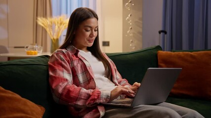 Home freelance work laptop using businesswoman girl female teen student distant studying night addiction computer typing chatting in apartment Caucasian woman on couch home online shopping web store - Powered by Adobe